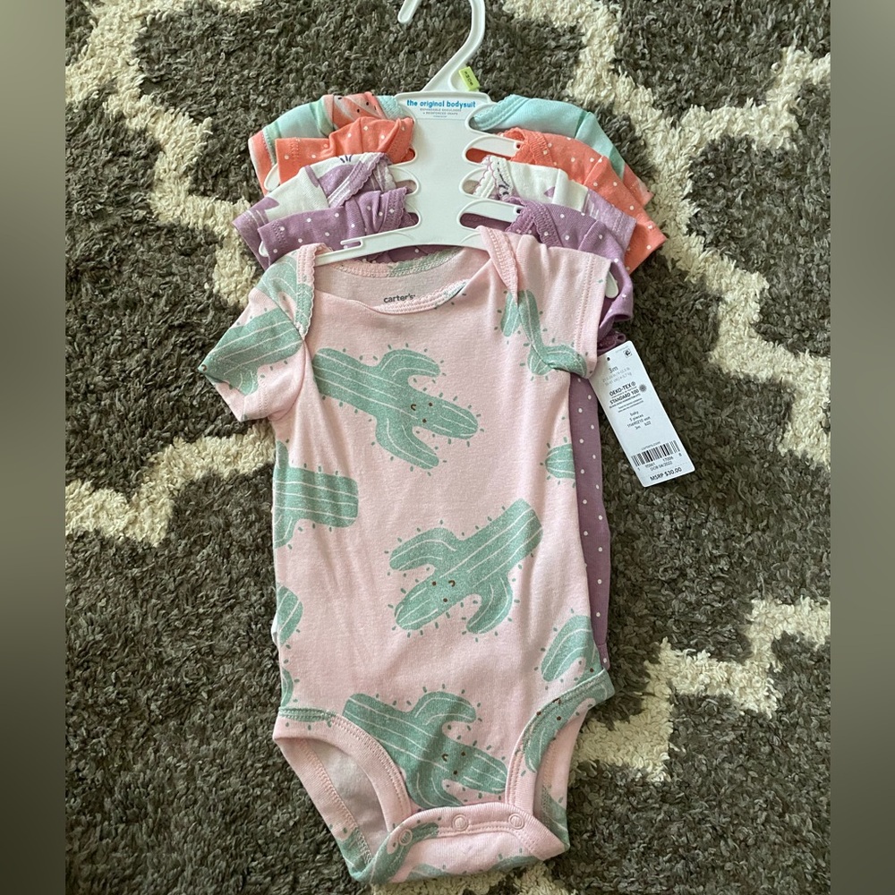 NWT baby onesies size 3 months